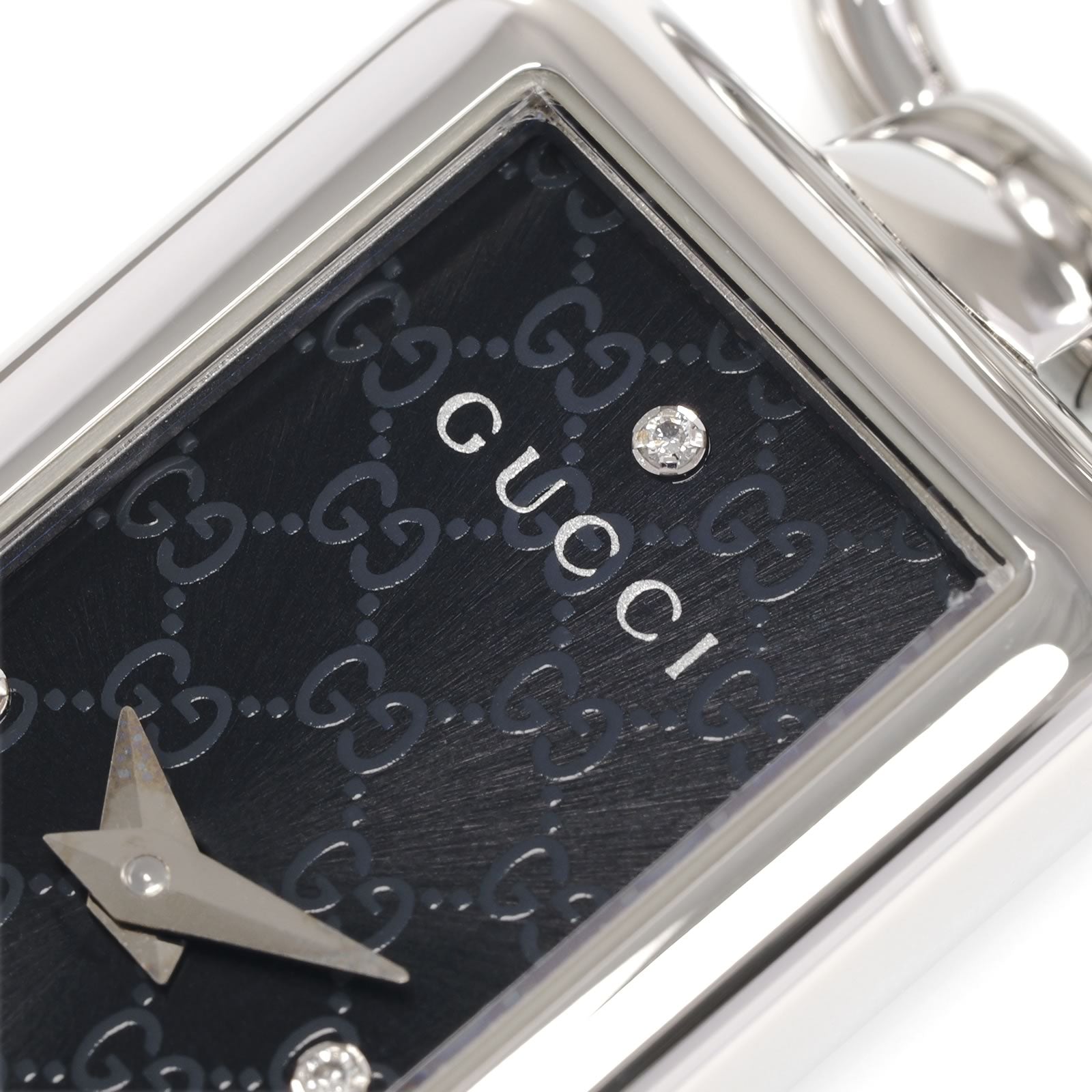 Gucci Tornabuoni 119 logo and diamond close up
