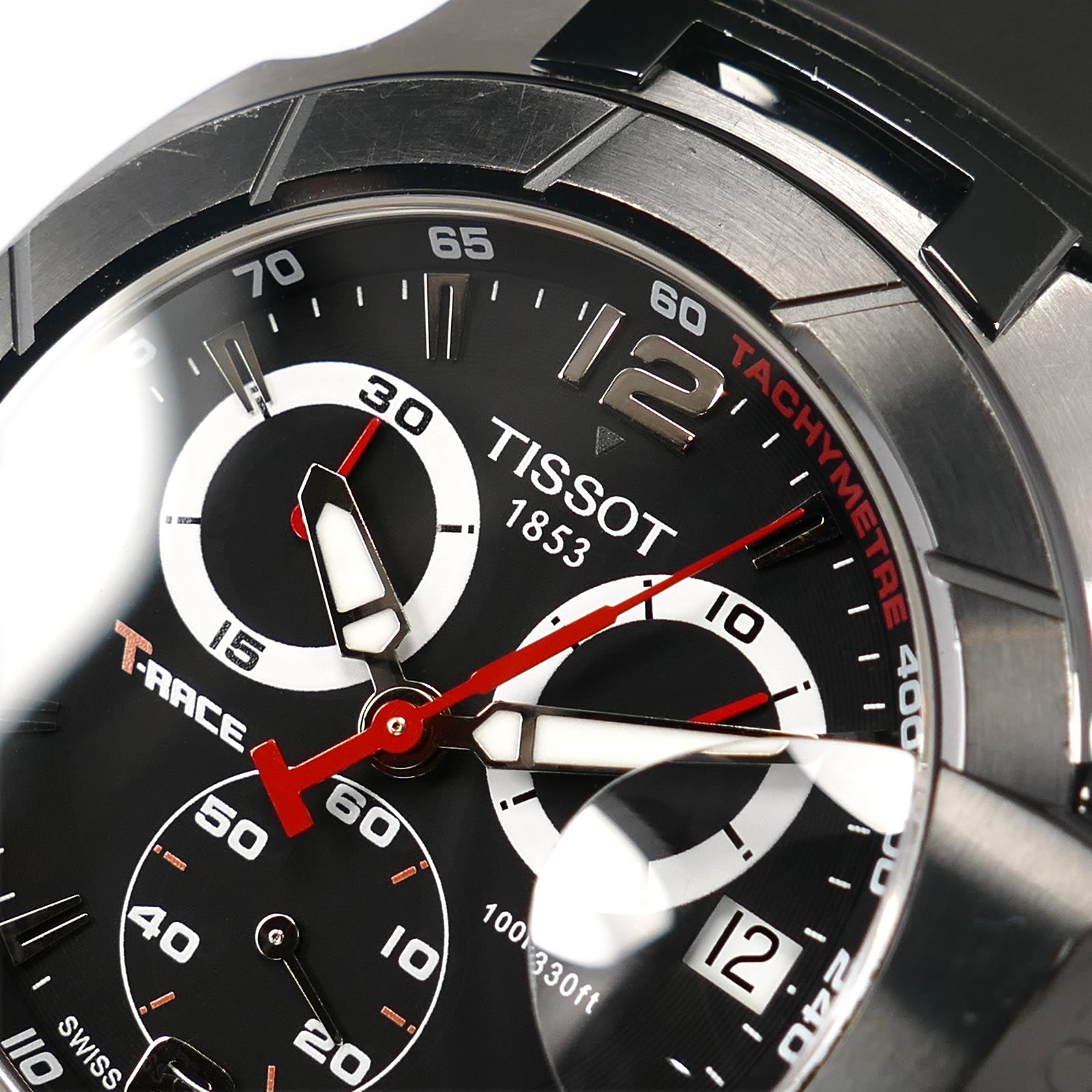 Tissot T-Race T048417A logo close up