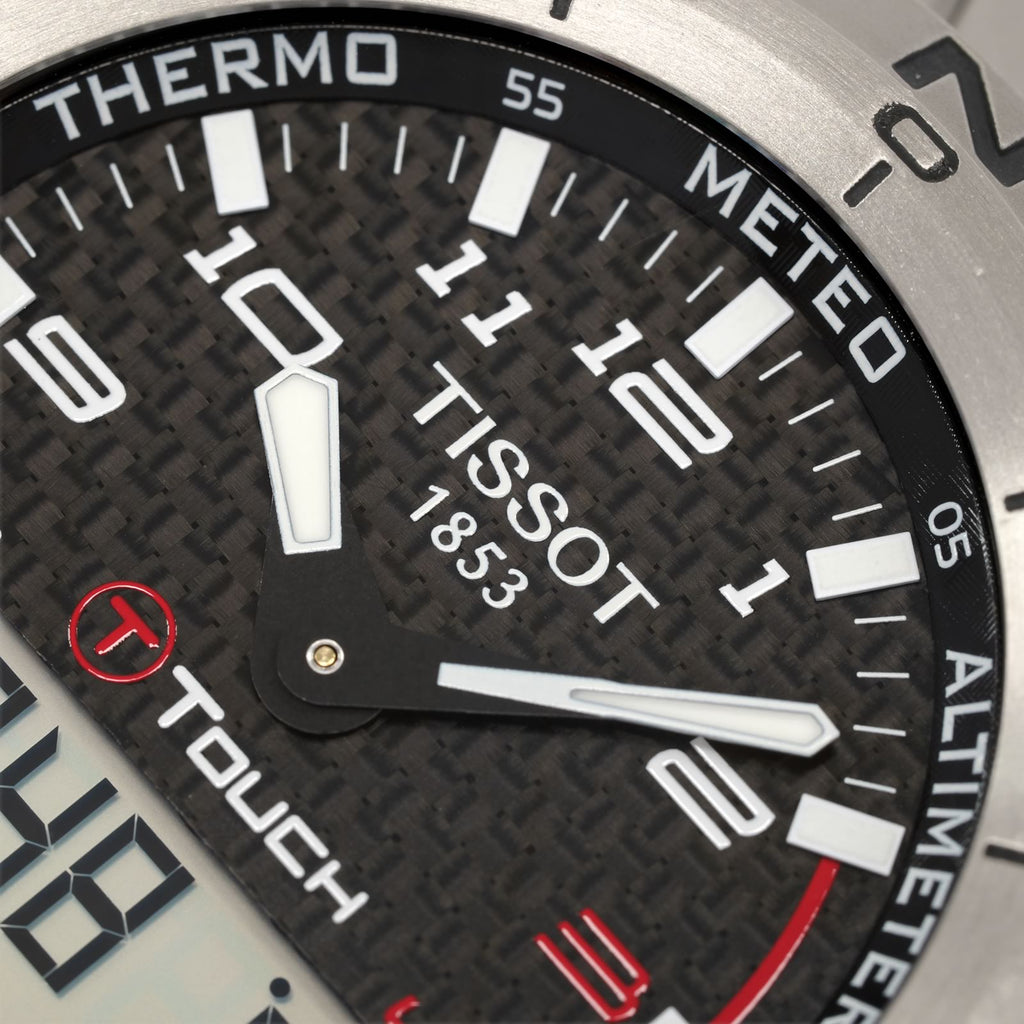 Tissot T-Touch Expert Titanium T013420A logo close up