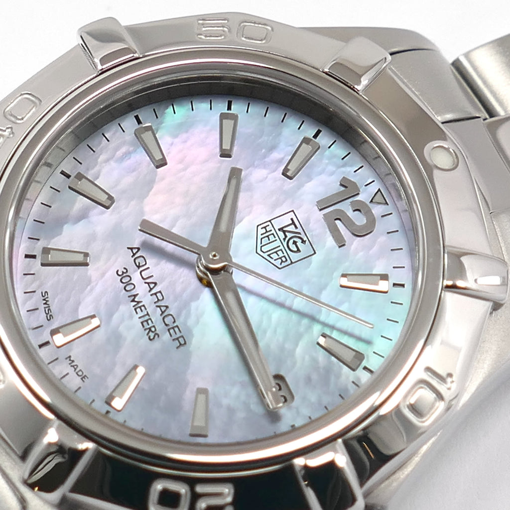 TAG Heuer Aquaracer WAF1417 Blue Iridescent Mother of Pearl logo close up