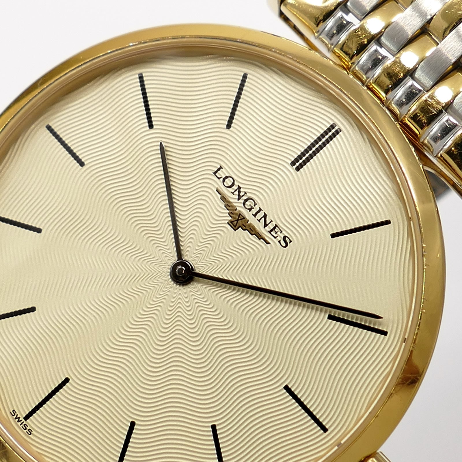 Longines La Grande L4.709.2 guilloche dial logo close up