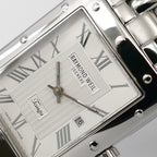Raymond Weil Tango 5380 guilloche dial logo close up