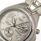 Tissot Titanium T645P logo close up