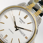 Tissot Automatic III T065430A logo close up