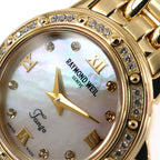 Raymond Weil Tango 5860 logo and diamond close up