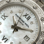 Raymond Weil Tango 5399 logo close up