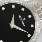 Movado Faceto 0605586 logo close up