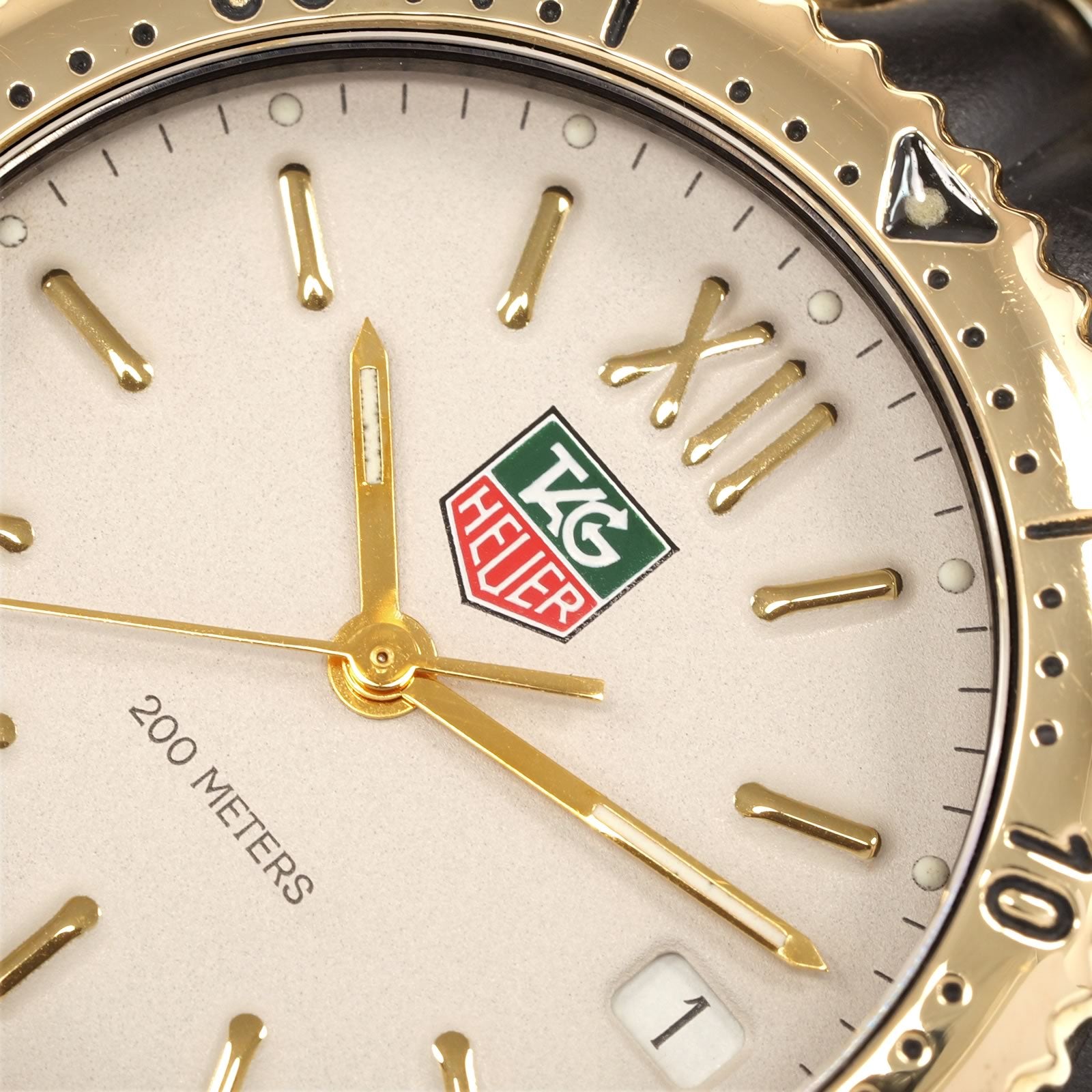 TAG Heuer SEL S93.313C logo close up