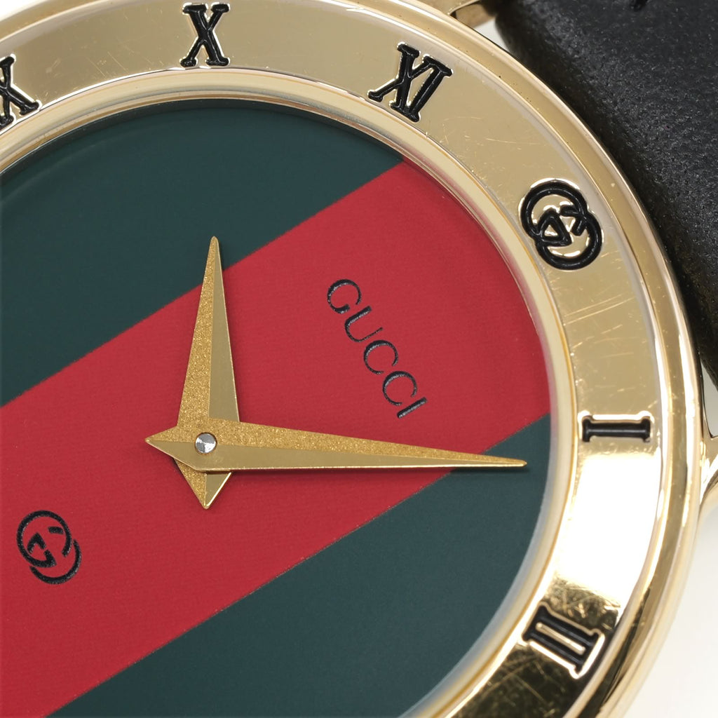 Gucci 3000L logo close up