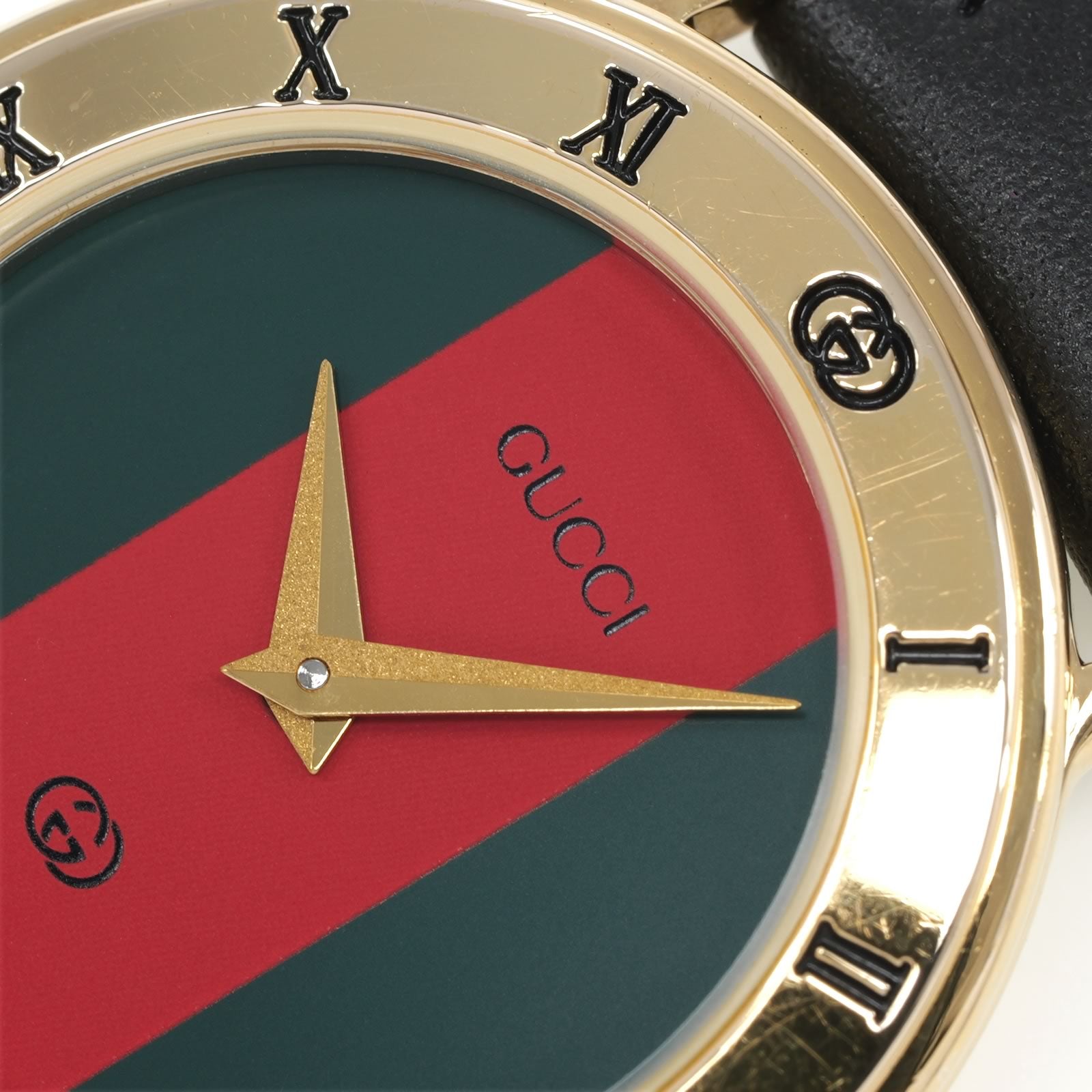 Gucci 3000L logo close up