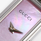 Gucci 1500L dial logo close up
