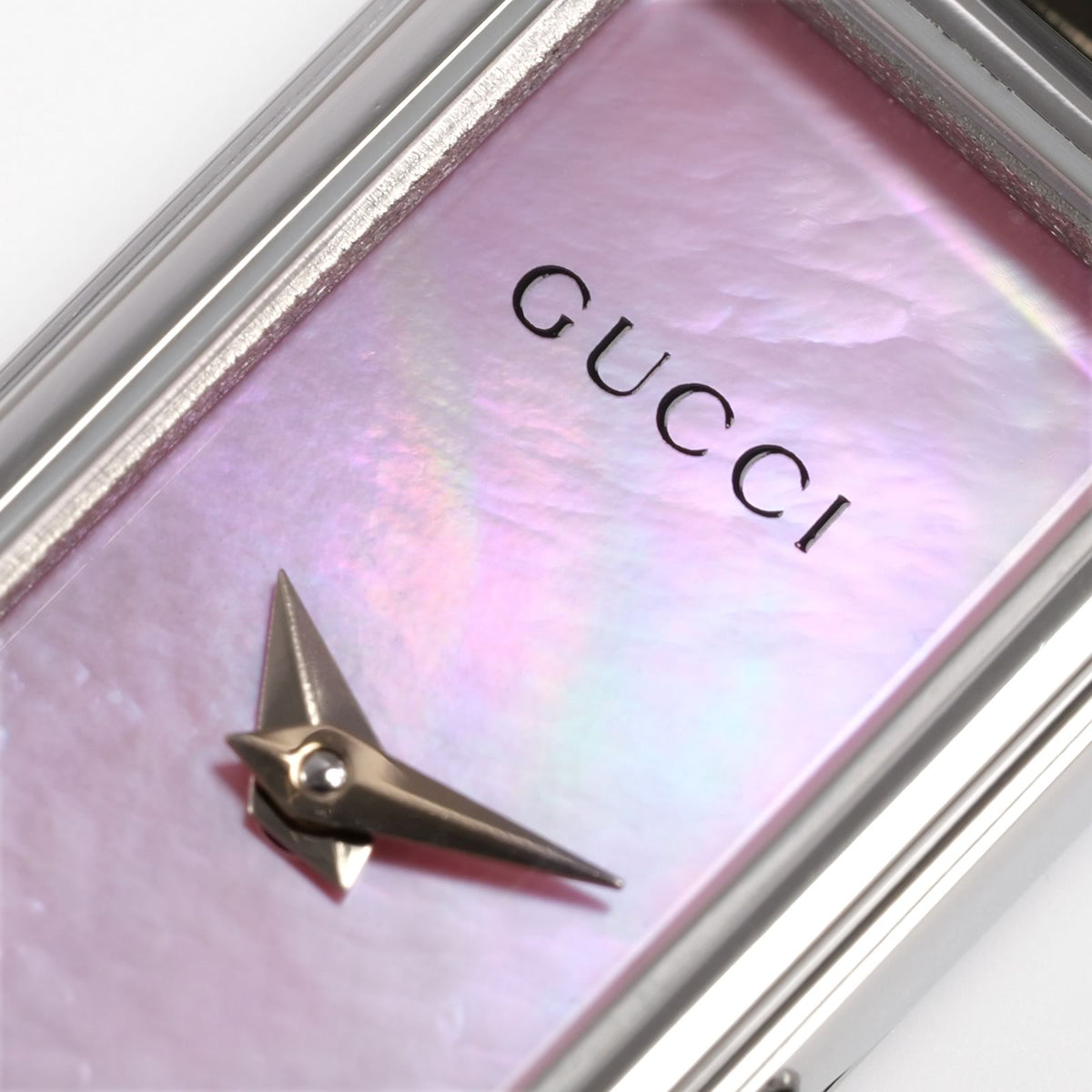 Gucci 1500L dial logo close up