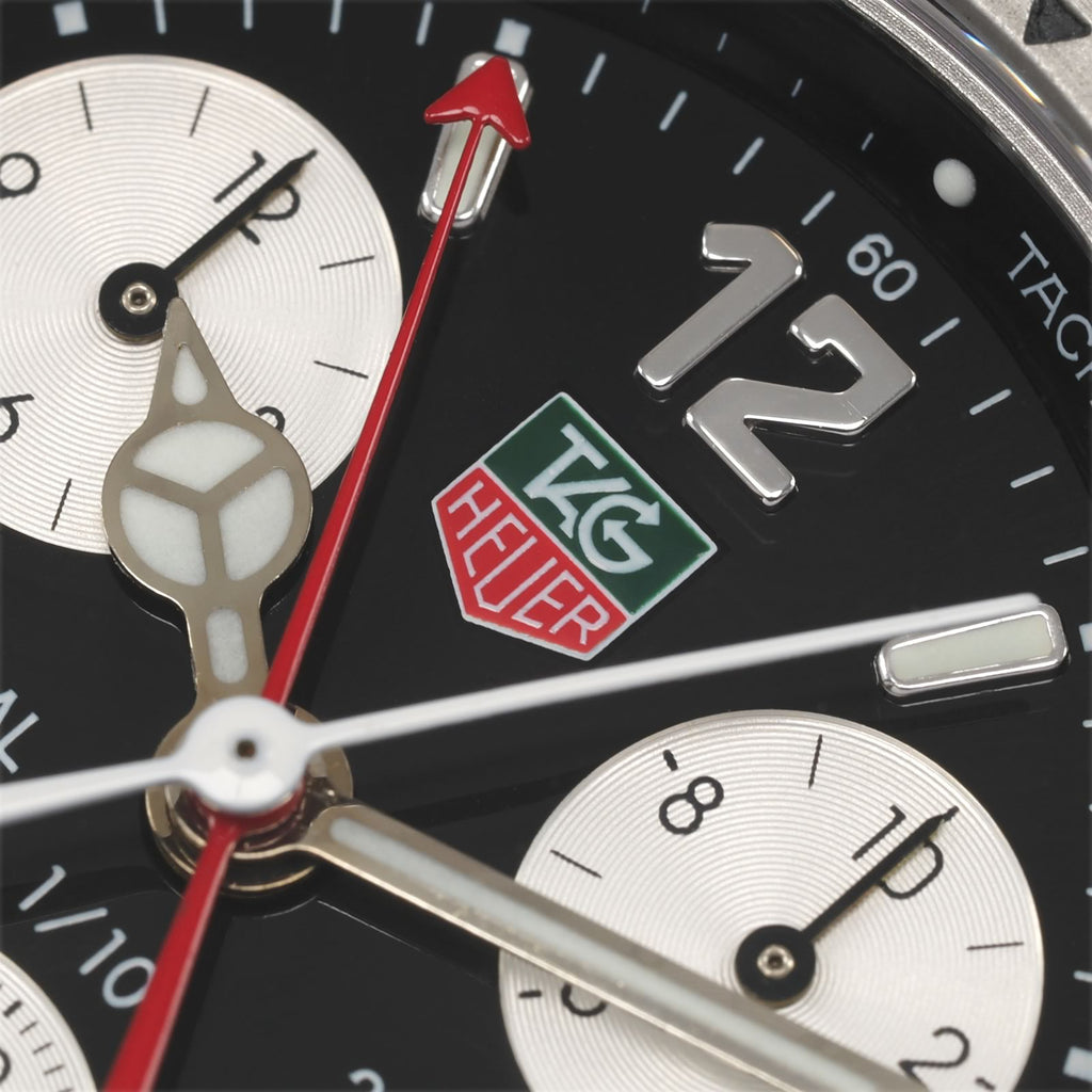 TAG Heuer 2000 Chronograph CK1110-0 red and green logo close up