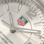 TAG Heuer Aquaracer WAF1412 red and gree logo close up