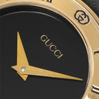 Gucci 3000L gucci logo and dauphine hands close up