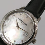 Raymond Weil Toccata 5388 logo and diamonds close up