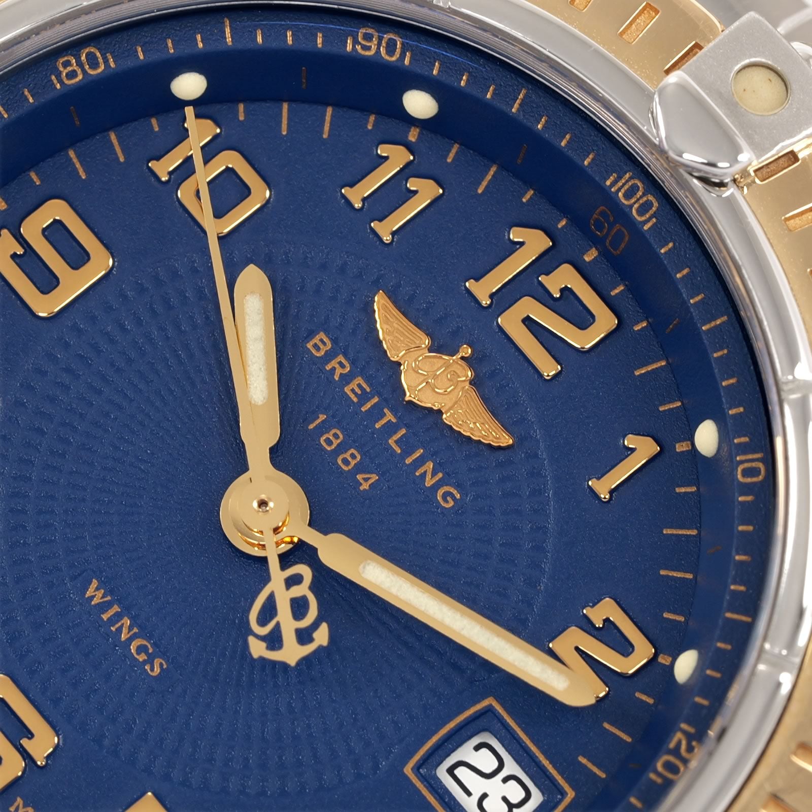 Breitling Wings D67050 gold logo close up