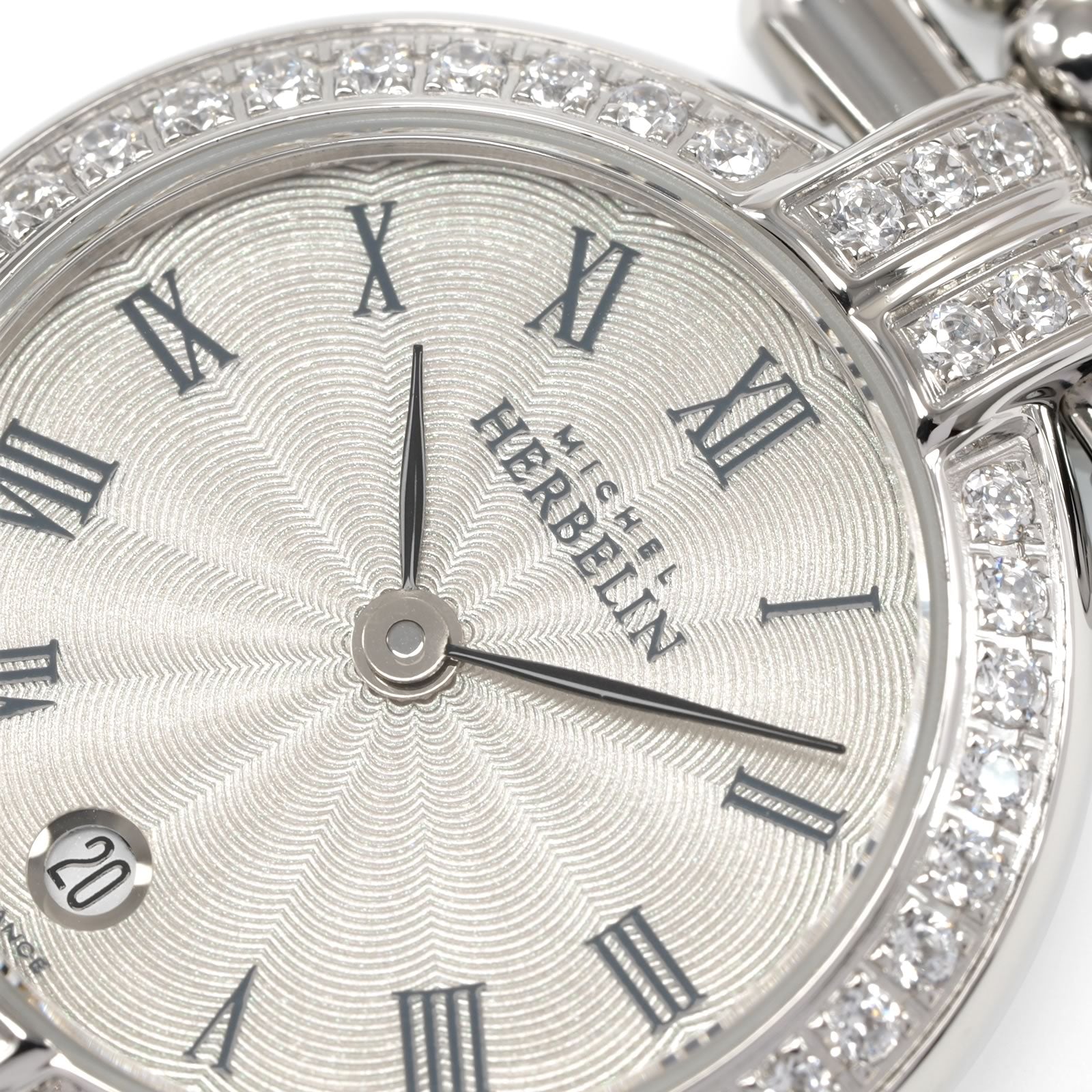 Michel Herbelin Perles 16873.B logo and diamonds close up