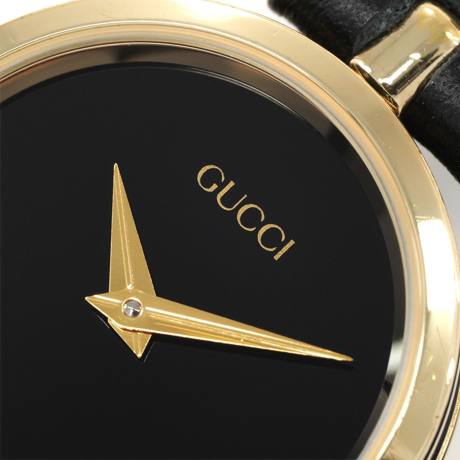 Gucci 2000L logo close up