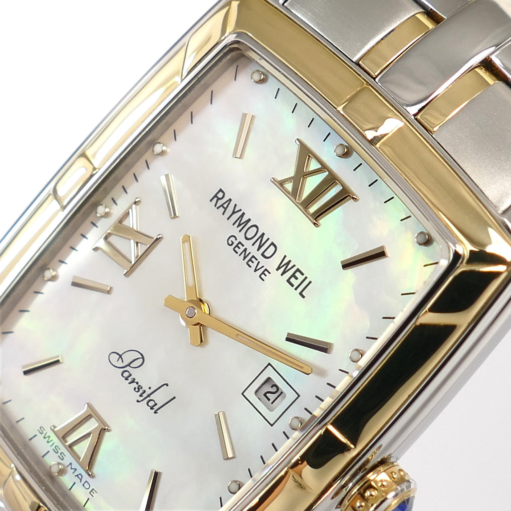 Raymond Weil Parsifal 9340 logo and Roman Numeral markers close up
