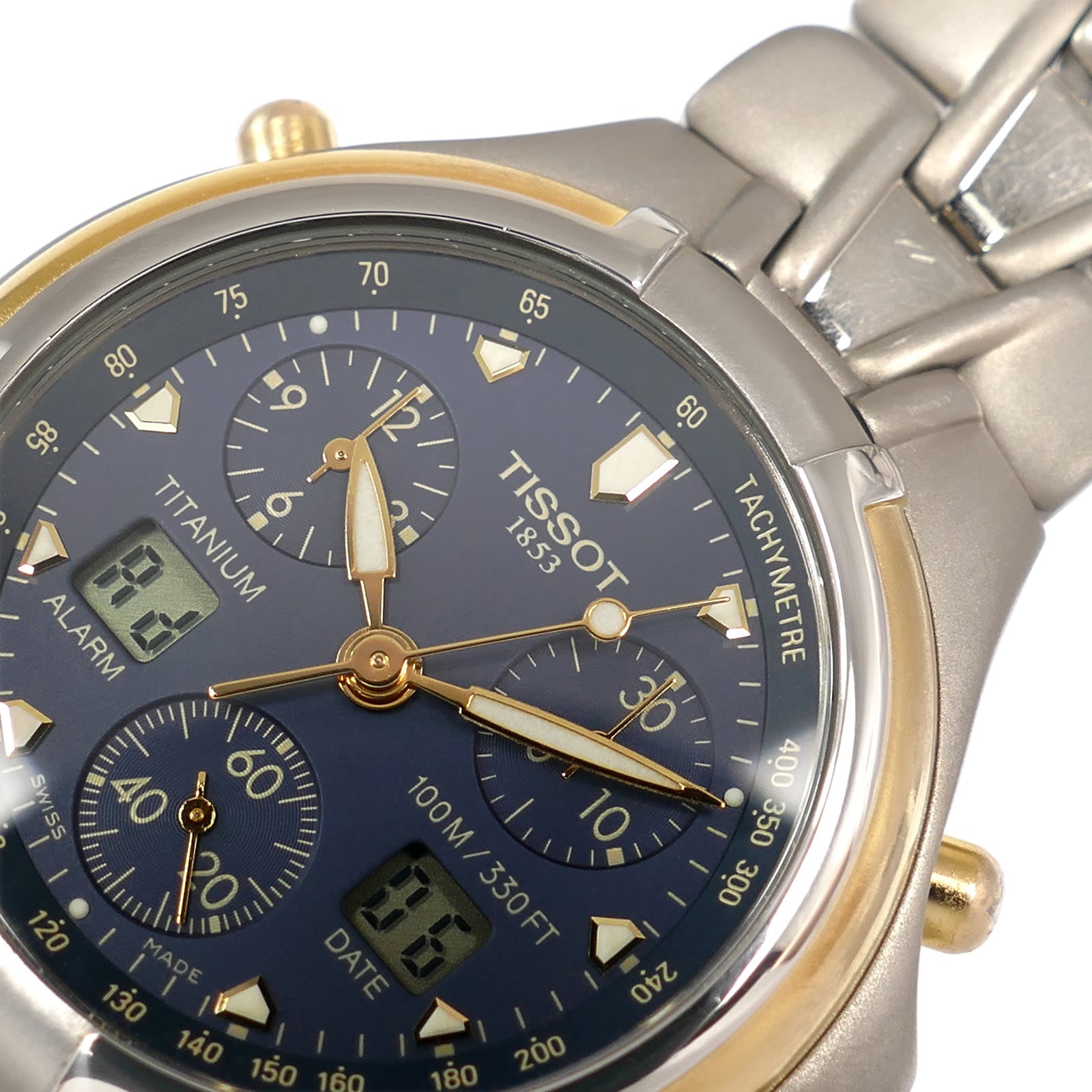 Tissot Titanium T671 logo close up