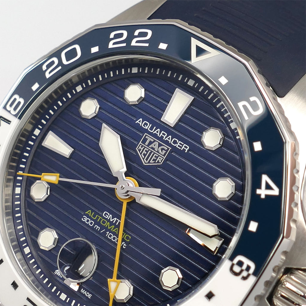 TAG Heuer Aquaracer GMT WBP2010 logo and octagonal markers close up