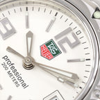 TAG Heuer Link WT1414 green and red logo close up