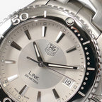 TAG Heuer Link WJ1111 logo close up