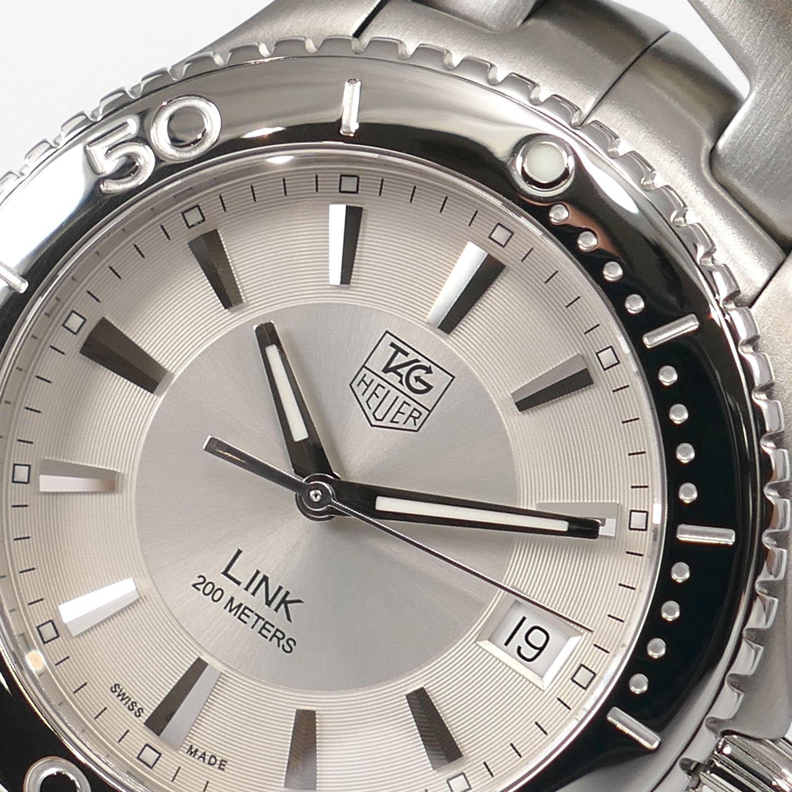 TAG Heuer Link WJ1111 logo close up