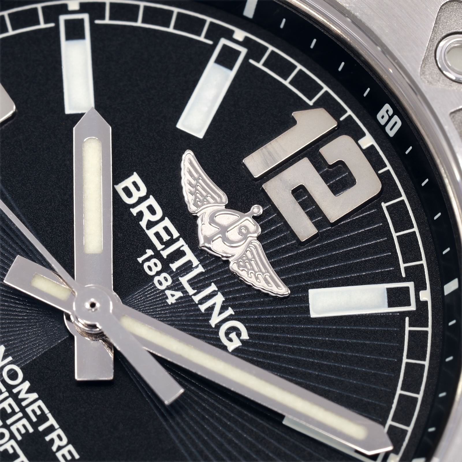 Breitling Colt 33 A77387 dial logo close up