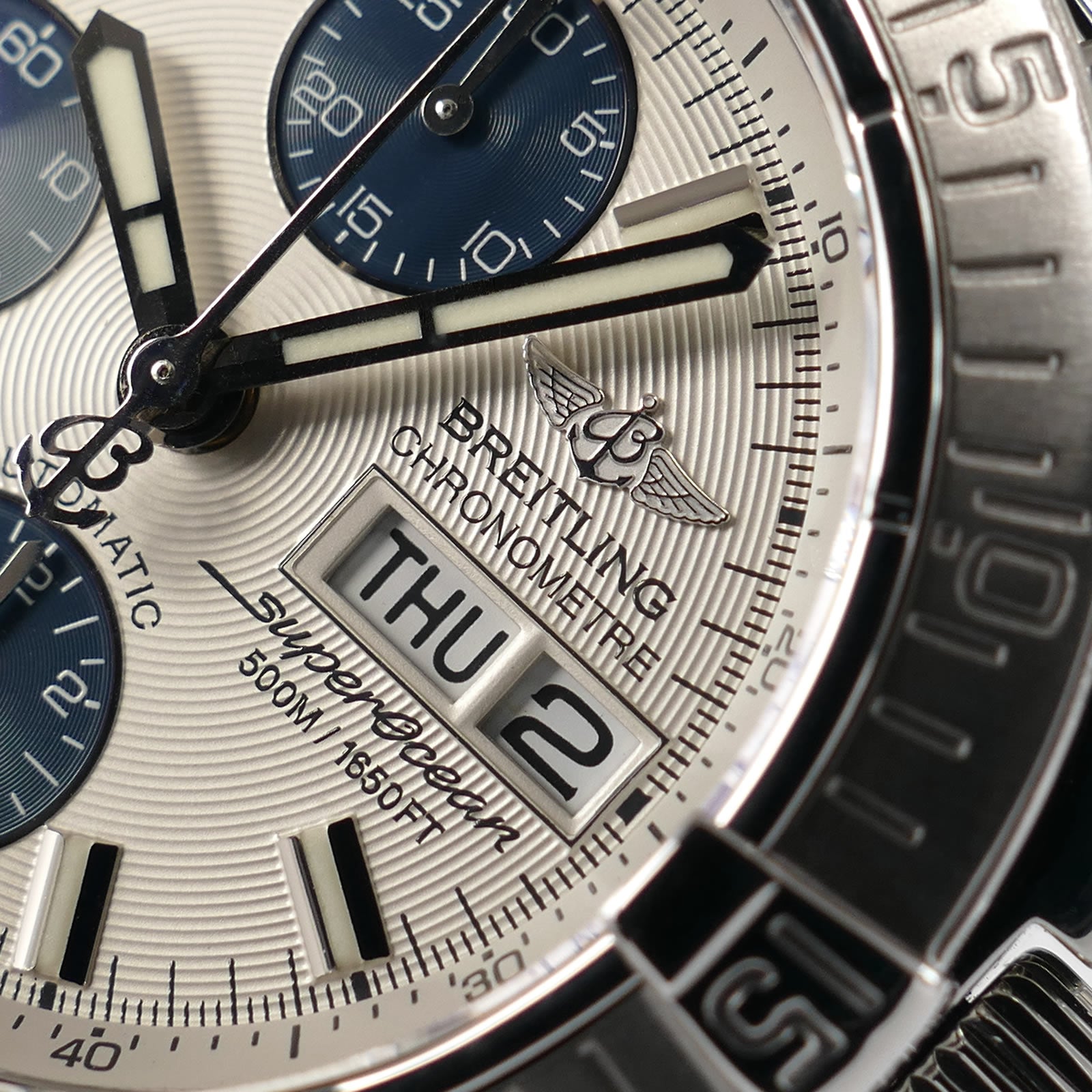 Breitling Superocean II A13340 logo close up