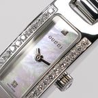 Gucci 3900L Iridescent Mother of Pearl and logo close up