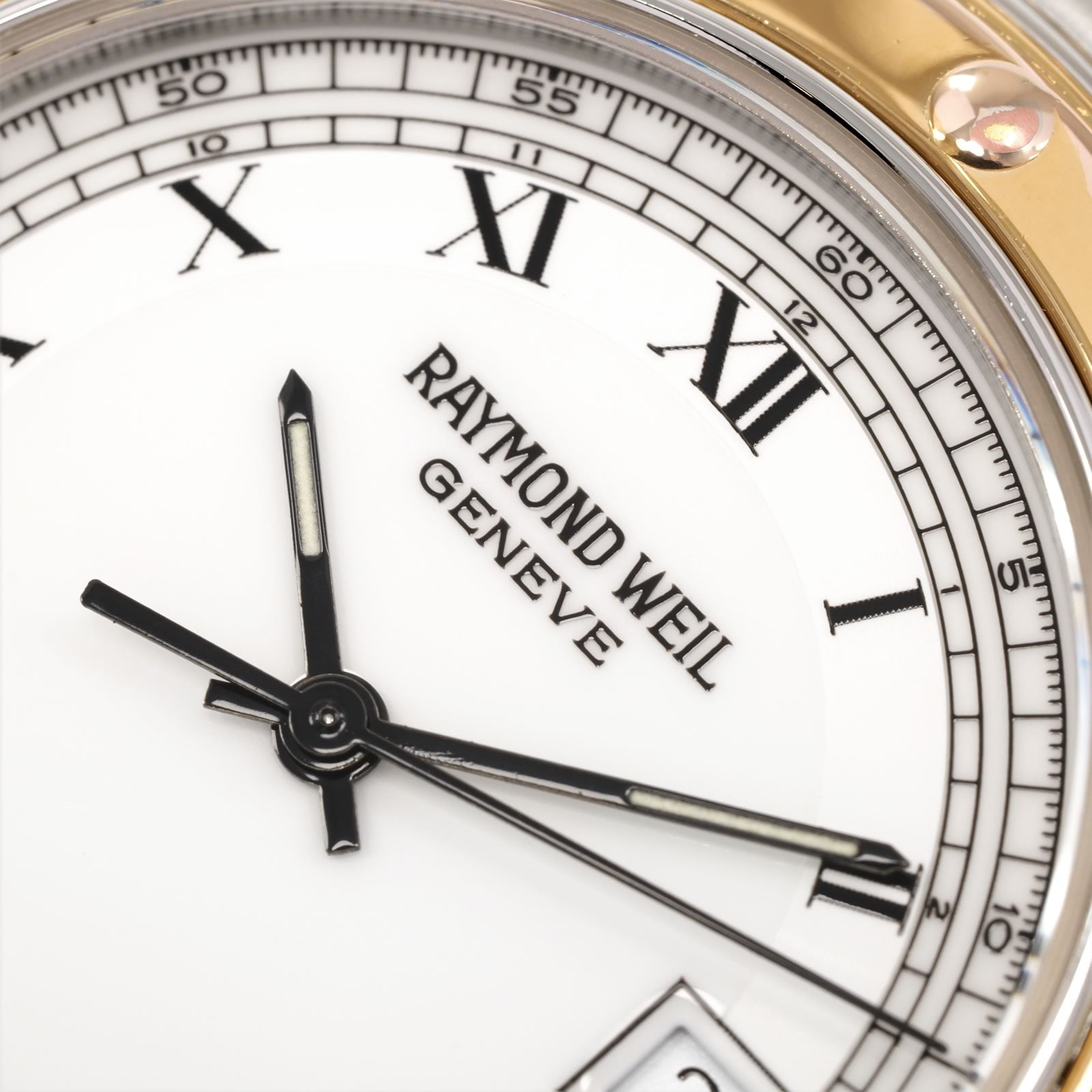 Raymond Weil Tango 5560 logo close up