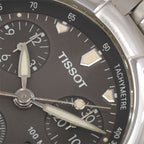 Tissot Titanium T670 dial logo close up