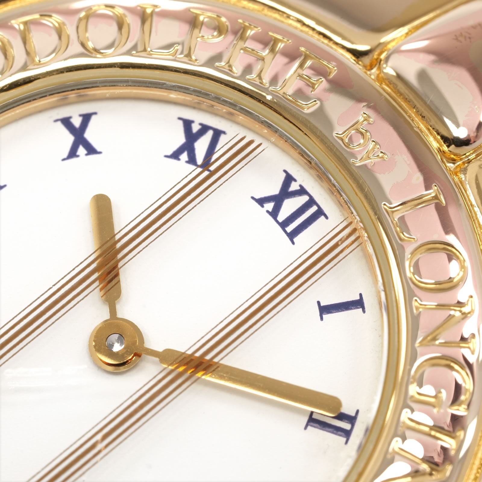 Rodolphe by Longines 18k gold plated bezel close up