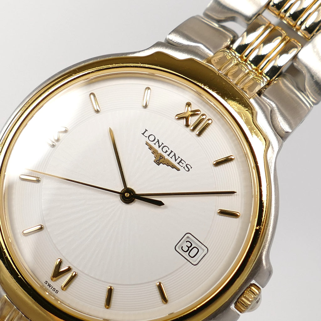 Longines Flagship L5.646.3 guilloche white dial logo close up