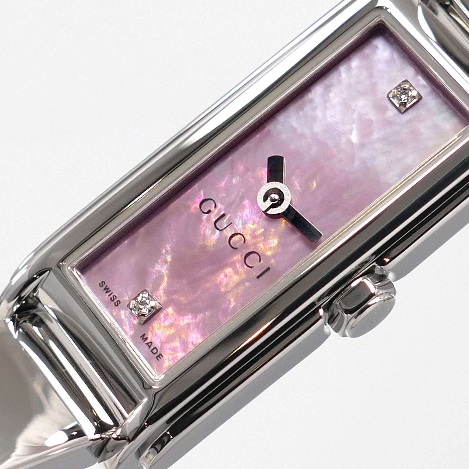 Gucci G-Line 109 logo and diamonds close up