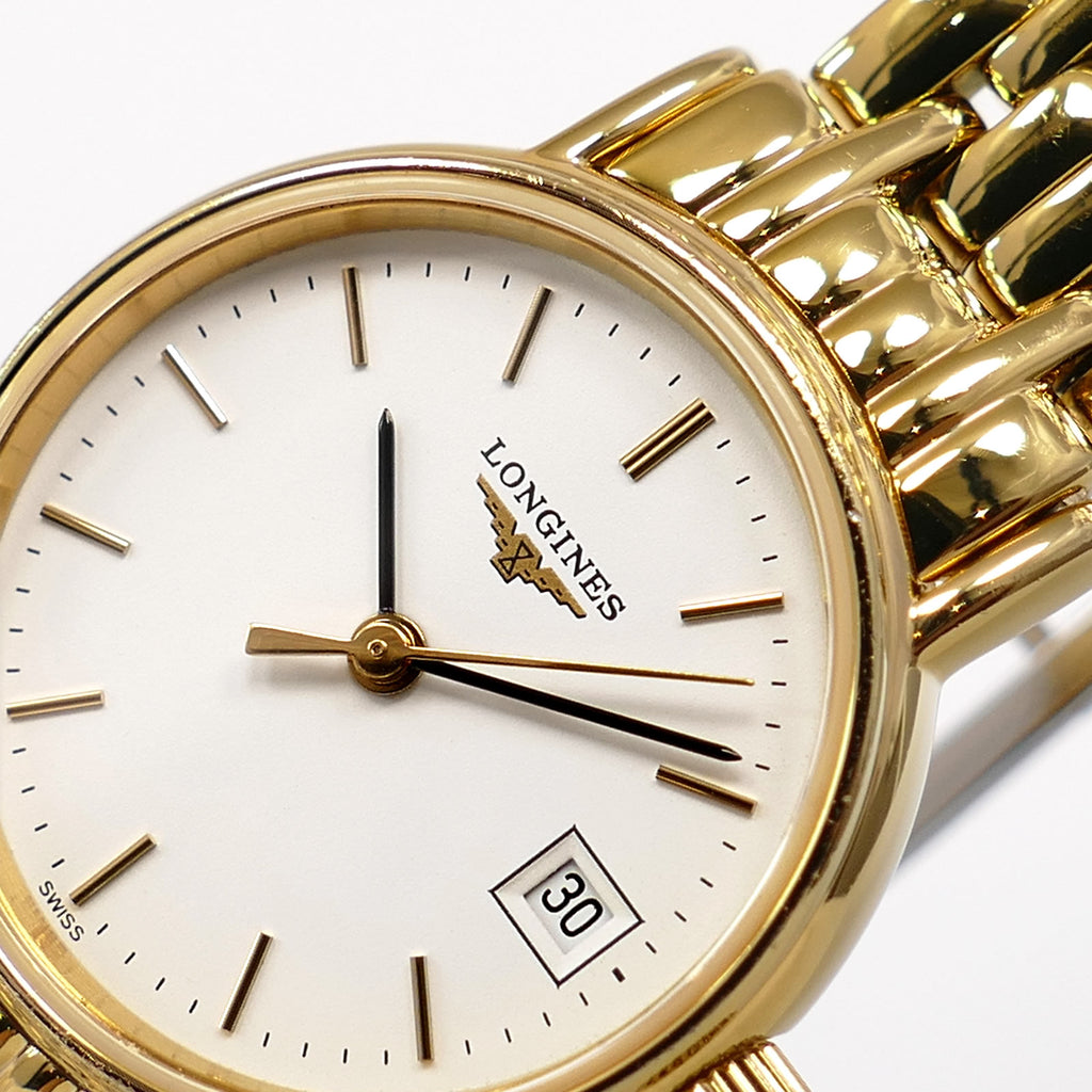 Longines Présence L4.220.2 logo close up