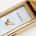 Gucci 1500L dial logo close up