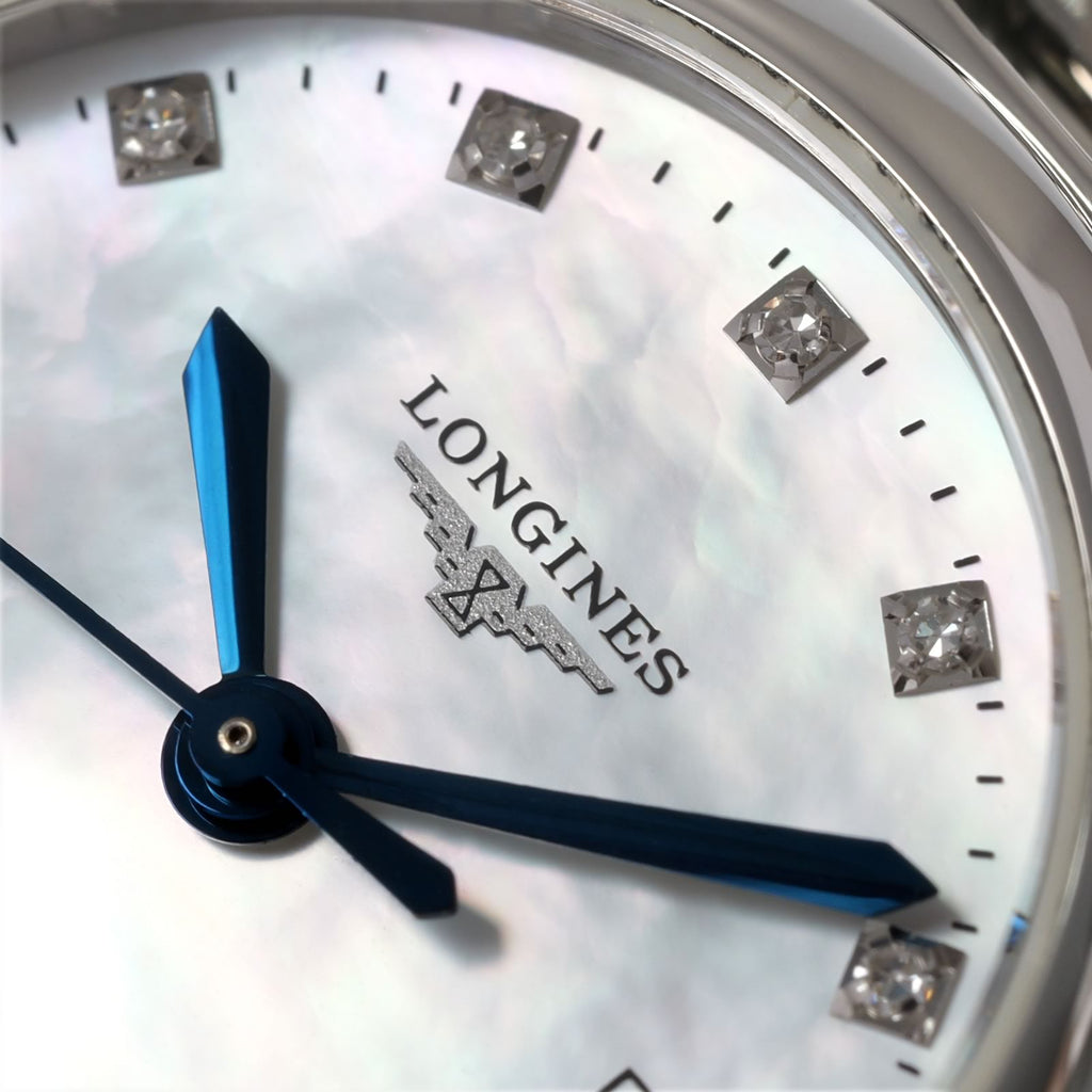 Longines PrimaLuna L8.110.4 logo close up