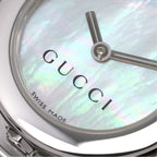 Gucci Twirl 112 logo close up