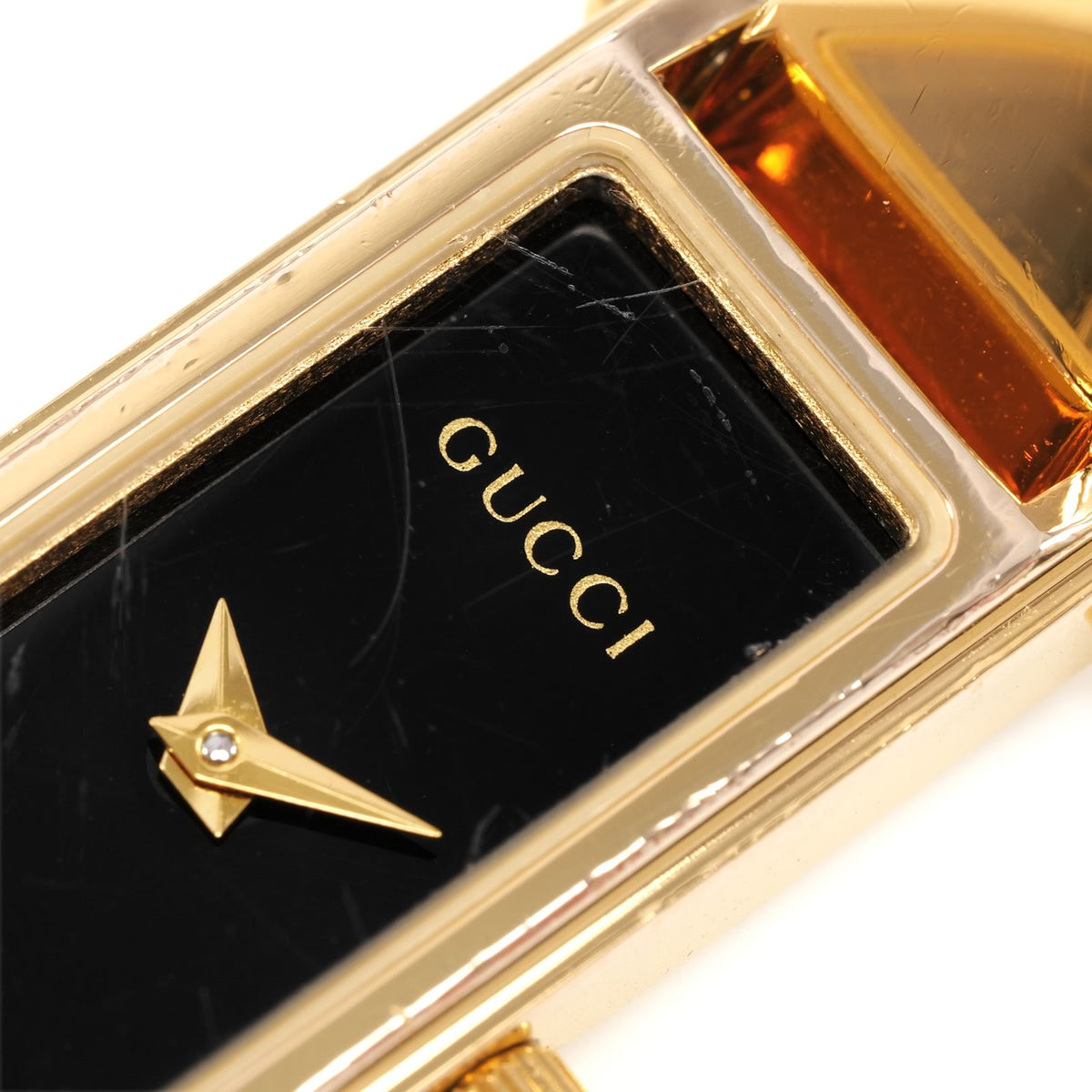 Gucci 1500L dial logo close up