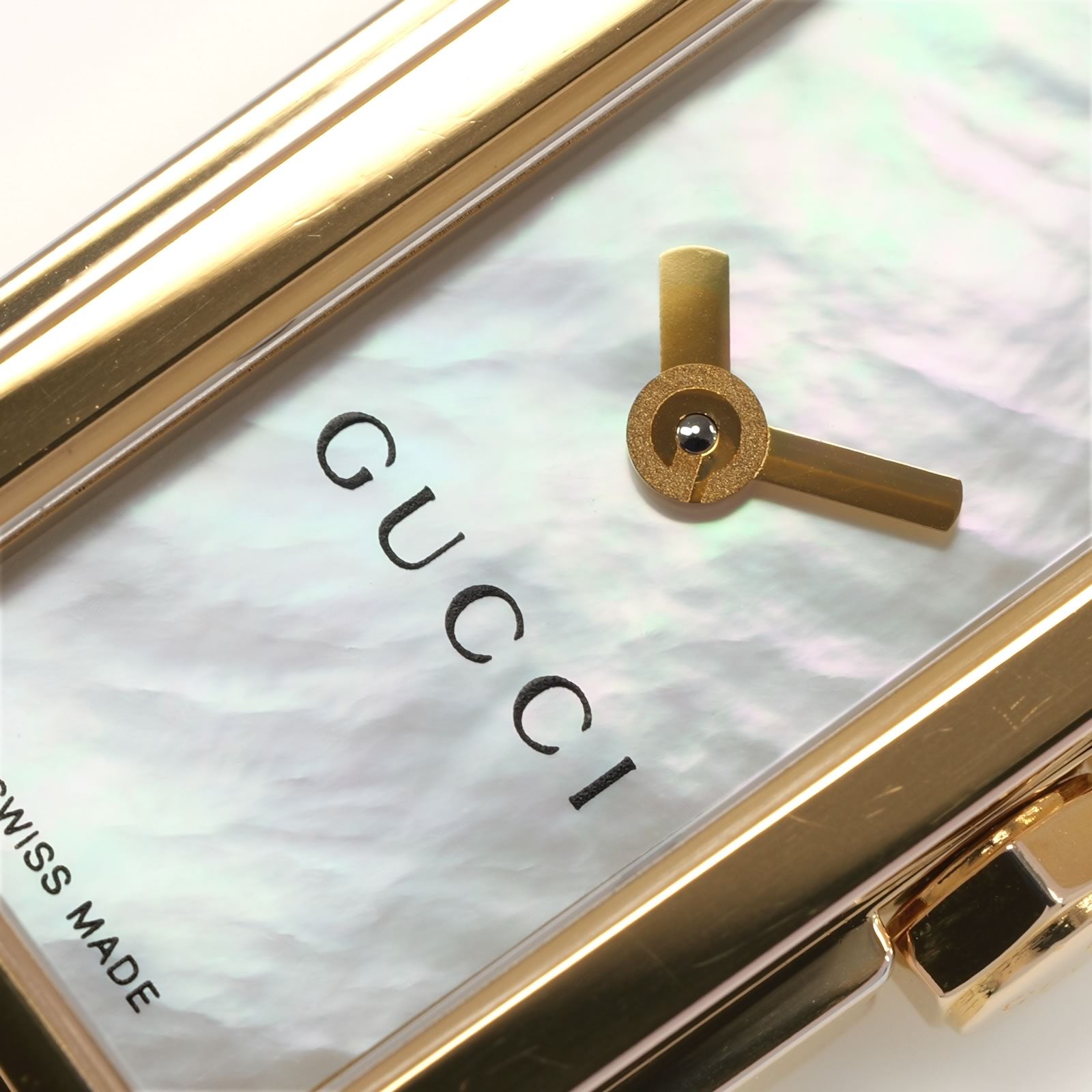 Gucci G-Line 109 logo and iridescent mother of pearl close up