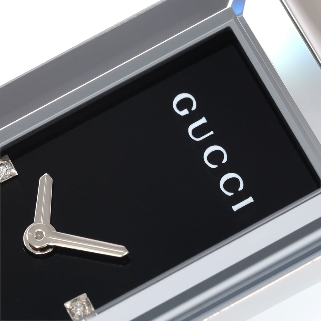 Gucci G-Frame 127.5 logo close up