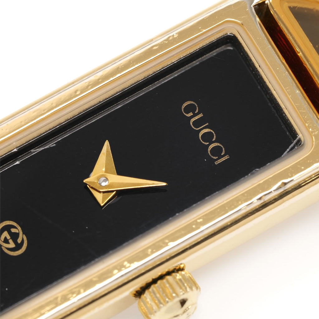 Gucci 1500L dial logo close up