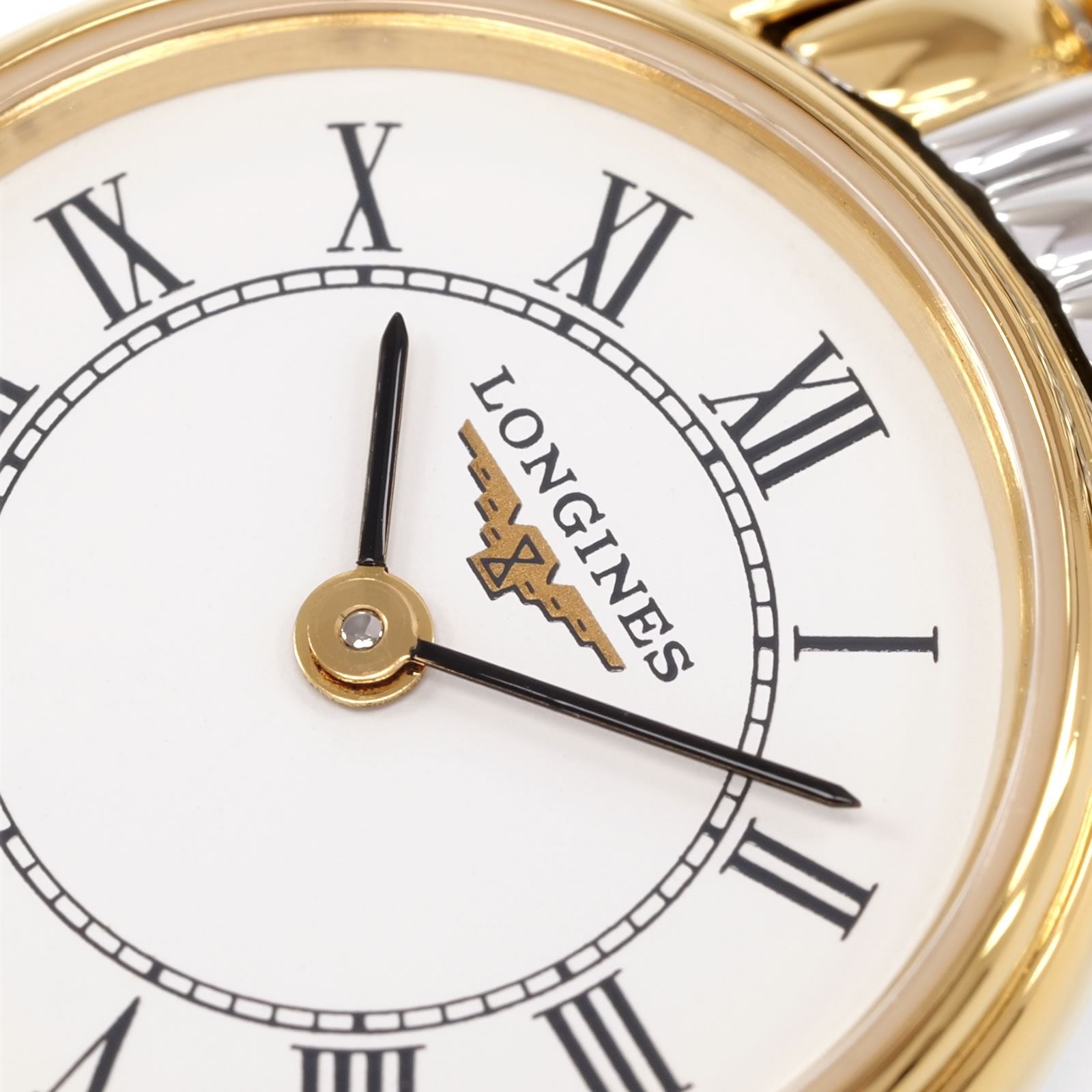 Longines Présence L4.219.2 logo close up