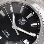 TAG Heuer Link WJ1110-0 logo close up