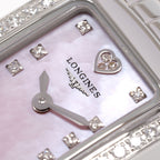 Longines DolceVita L5.158.0 logo and diamond heart close up