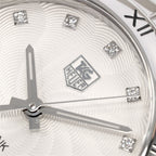 TAG Heuer Link WAT1311 logo close up