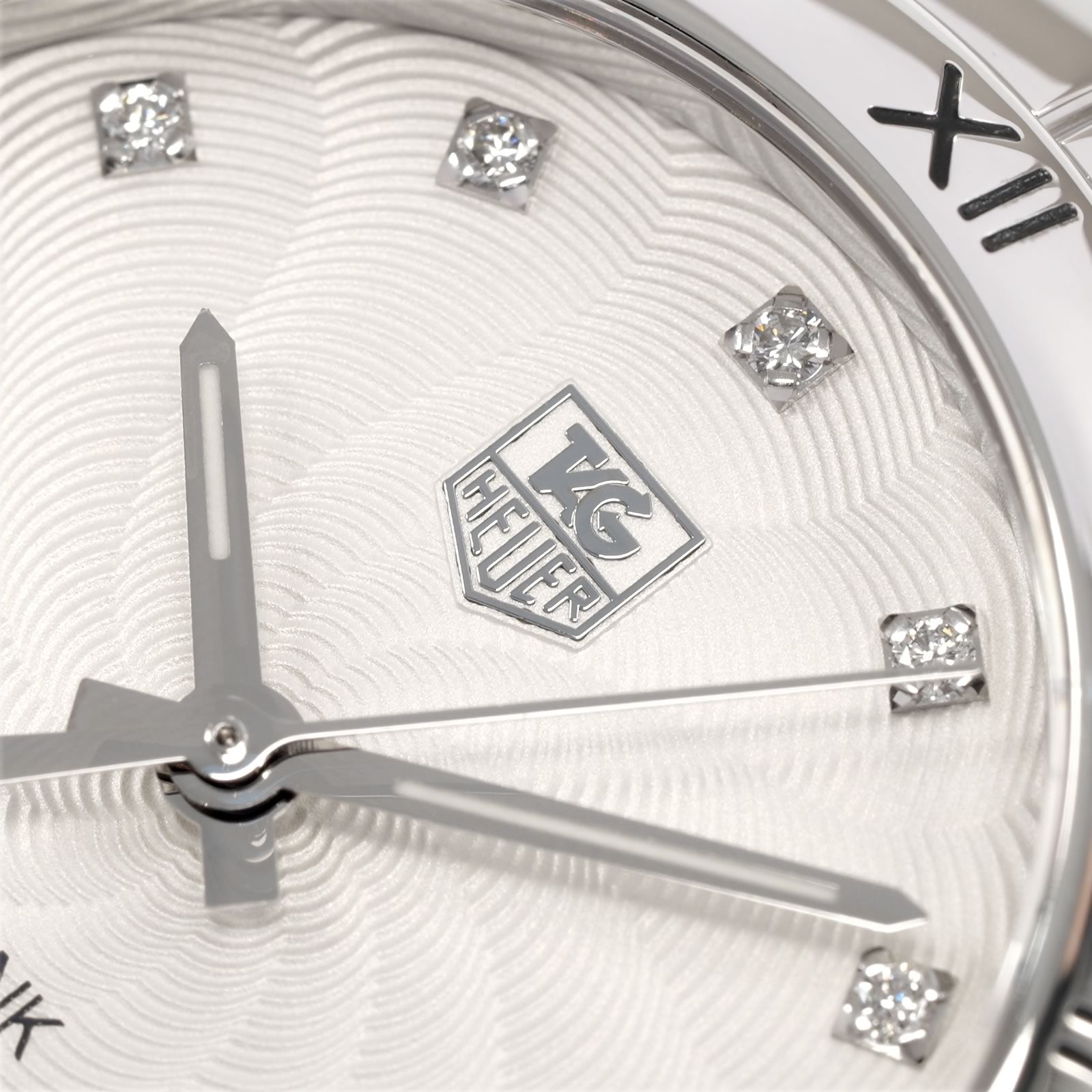 TAG Heuer Link WAT1311 logo close up
